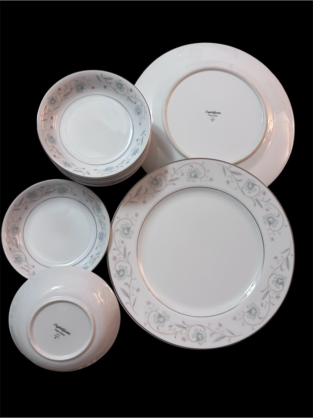 White Porcelain Dinnerware Set with Pale Blue and Pink Floral Border